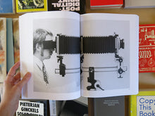 Load image into Gallery viewer, Holding the Camera
